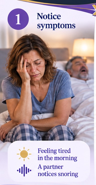 Woman feeling tired in the morning while her partner sleeps behind her.